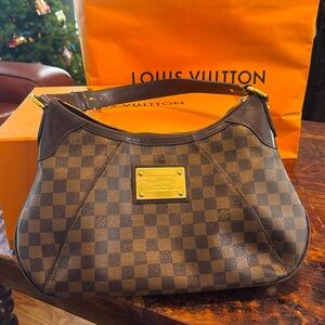 Louis Vuitton Inventeur women’s handbag